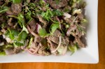 Crying Tiger:Grilled sliced beef mixed with lime juice, fresh chili, onion, cilantro and Thai basil leaves or mint.