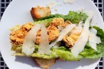Oyster Caesar salad. The things in the middle are oysters, not croutons.