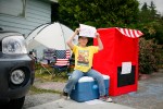 Sid Johnson, 7, sells beverages outside of his house near Gasworks Park in Seattle, Wash., on Sunday, July 4, 2010.  (Photo by Matthew Williams for The Seattle Weekly)