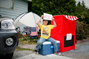 Sid Johnson, 7, sells beverages outside of his house near Gasworks Park in Seattle, Wash., on Sunday, July 4, 2010.  (Photo by Matthew Williams for The Seattle Weekly)