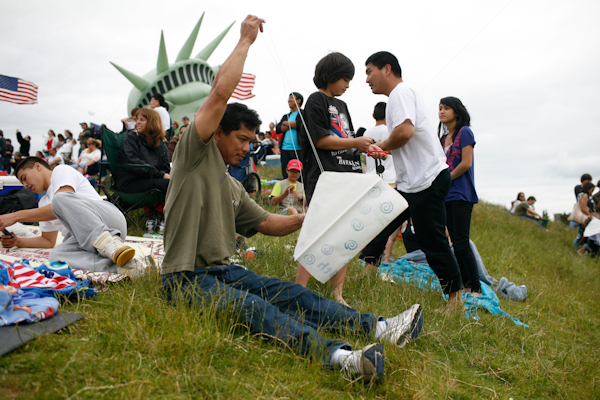 People fly kites at Gasworks Park during the Family 4th Picnic in Seattle, Wash., on Sunday, July 4, 2010. (Photo by Matthew Williams for The Seattle Weekly)
