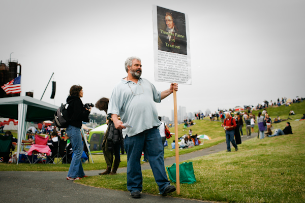 Jim Hoerst hands out flyers about Thomas Paine and taxation at Gasworks Park during the Family 4th Picnic in Seattle, Wash., on Sunday, July 4, 2010. (Photo by Matthew Williams for The Seattle Weekly)