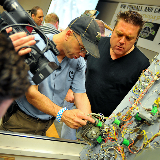 Clay Harrell (AKA Shaggy), star of the hit pinball restoration series, This Old Pinball. Clay doing a hands-on, how-to on pinball repair and restoration working on actual games at the show.