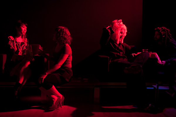 Partyers sit on the couches during the SAM Remix in Seattle, Wash., on Friday, June 4, 2010.  The event included the "Pop Culture Fashion" runway show, music with DJ Riz, and many more activities and performances.  (Photo by Matthew Williams for The Seattle Weekly)