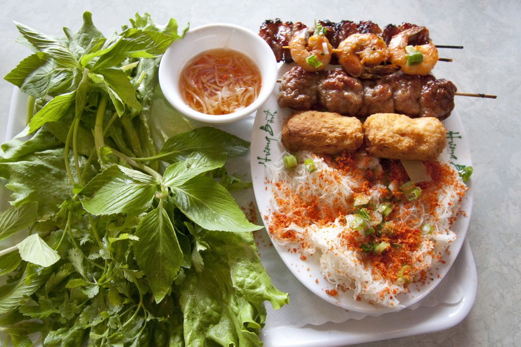 Woven noodles with grilled pork, shrimp and sugarcane.