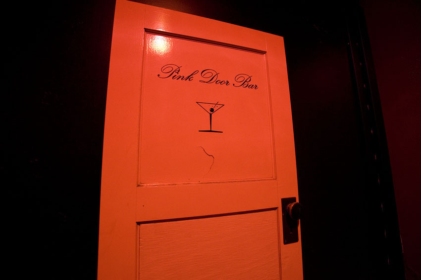 Just down the way on Post Alley is The Pink Door.