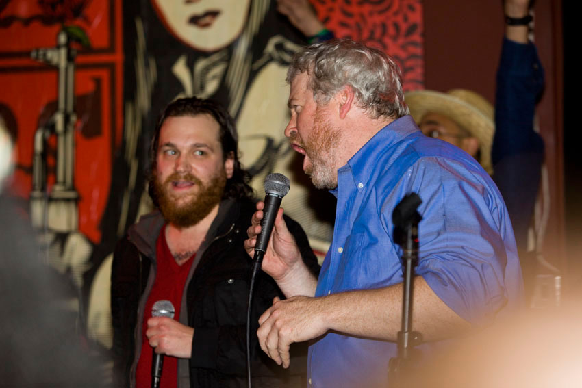 and reminds the crowd to vote this Tuesday.