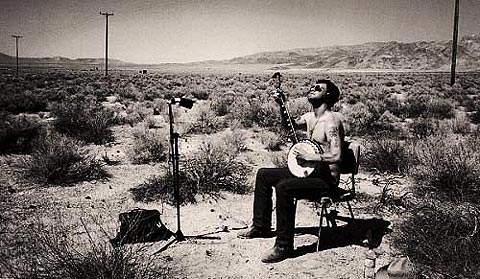 William Elliot Whitmore, Sunday, November 1:When people talk about someone having aEœan old soul,aEA theyaE™re talking about people like William Elliot Whitmore.A  Though barely into his third decade, WhitmoreaE™s music sounds like it should be issuing from the mind and mouth of someone at least double that.A  His songs chronicle lives of hard-fought survival, both practical and spiritual, usually accompanied by nothing more than sparse banjo or guitar.A  Tales of woe are WhitmoreaE™s element, and he sings his laments with a gravelly, pained voice that sounds steeped in whiskey and brimstone.A  That voice is WhitmoreaE™s strongest asset, lending a visceral credibility to material that would make most musicians his age seem like imposters trying to fill their grandfatheraE™s boots, penning songs about lives they havenaE™t had time to live.A  When Whitmore sings about run-ins with aEœJohnny LawaE, itaE™s not a brash young man fighting against authority, itaE™s a pained, resigned stoic airing his grievances.A  Resignation and hope are never far apart in WhitmoreaE™s lexicon, and he demonstrates this most starkly on his latest, Animals in the Dark.A  The album keeps most of WhitmoreaE™s hallmarks, simply adding a bit of backbone to a set that includes calls to action alongside his usual cries of outrage. With Hoots and Hellmouth. Tractor Tavern, 5213 Ballard Ave. N.W. 789-3599. 8 p.m. $8 adv./$10 DOS. Note by NICHOLAS HALL