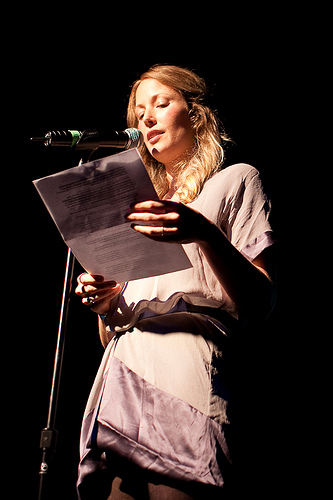 His sister, Aja, introducing the band.