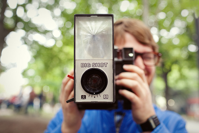 Michael is a big shot with his new Polaroid camera.