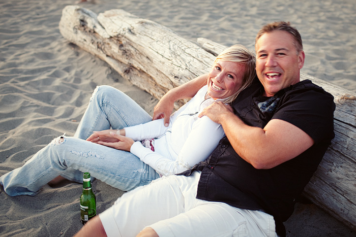 Christin & Erik are only on their fourth date, drinking O'Douls and cuddling up next to some driftwood.