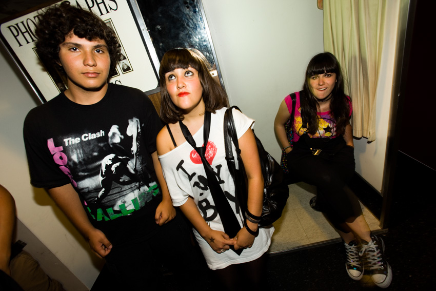Daniel Aguilar, Cristina Galiana and Laura Jimenez (of Madrid, Spain) hang out in the photobooth.