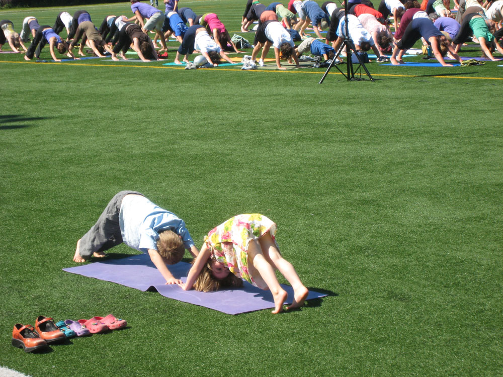 Saturday morning saw several hundred people fill Cal Anderson Park for Equalityoga,