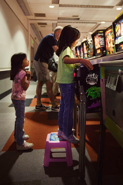 Twins Anna (left) and Celina (right) take turns playing Creature from the Black Lagoon.