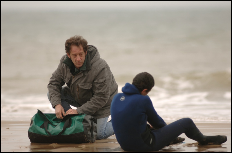 Welcome: Europeans--the filmmakers, at least--are fascinated with the subject of immigration. Recent dramas like Michael Winterbottom's In This World have been unsparing in their view of Fortress Europe, which slams the door on refugees from countries destabilized by the wars and politics of the West. From France, Philippe Lioret's Welcome tackles the same topic, though with more of a conventional coach-and-athlete Rocky approach. The coach (Vincent Lindon) is a middle-aged former swimming star who now leads water aerobics classes at a municipal pool in Calais, on the English Channel. The athlete is a 17-year-old Kurdish Iraqi refugee trying to reach his girlfriend in London. He fails at other avenues of smuggling (boat, truck, etc.), so you can guess his next thought when he shows up at the pool for a swimming lesson. It's illegal to help the refugees who huddle outside a Red Cross feeding station, where the coach's soon-to-be ex-wife volunteers. He wants to impress her. But, more than that, he's lonely; and the couple had no kids. Yes, formula is strongly at work here, but Casablanca was formulaic, too. And the veteran actor Lindon some of that same Bogart weariness: the burden of ideals one dares not show, the yearning of a cause worth fighting for. (NR) REVIEW BY BRIAN MILLER Harvard Exit: 4 p.m., Sun., May 24 (also 9:15 p.m. Tues., June 2).