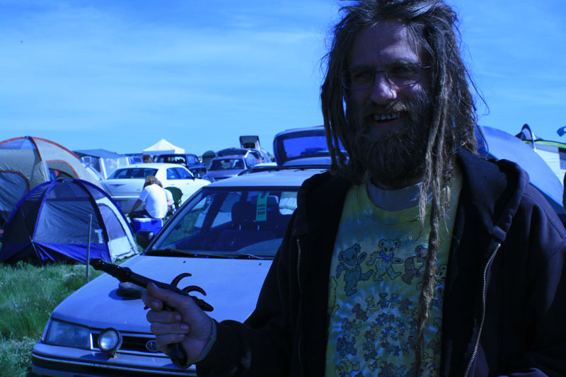 Check out his gun-shaped pipe.