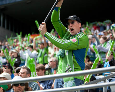 A Sounders supporter shows his colors.
