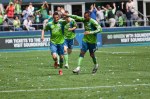 Sebastien Le Toux celebrates with Tyrone Marshall after scoring the first goal of the match and his first as a Sounder.