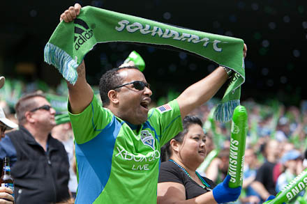 Fans celebrate after Seattle's only goal of the match is scored.
