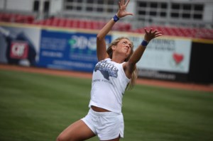 Is this member of the Dallas Desire preparing to: a. catch a football; b. fondle an airborne teammate?