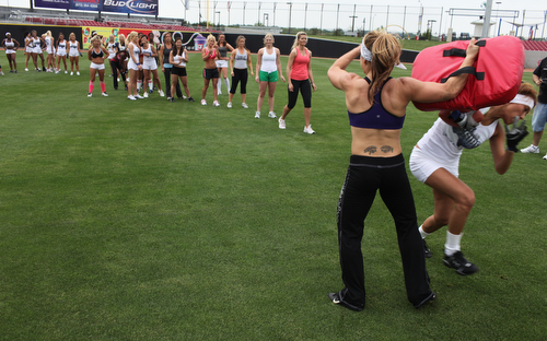 Dude, this coach is the buffest player out there. Why isn't she playing?