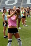 This isn't the first time she's played football, we swear!
