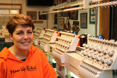 aEœMan Up Bitch:aE the New aEœNo FearaE: Kris Bjork's full-time business is an embroidery company, Logos NW, which she runs out of her home. But in her spare time, the West Seattleite makes and sells clothes that sport a slogan spotted on pickup trucks around the city: Man Up Bitch!