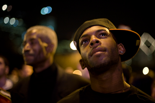 Chicagoans watch the CNN broadcast as polls close across the United States.