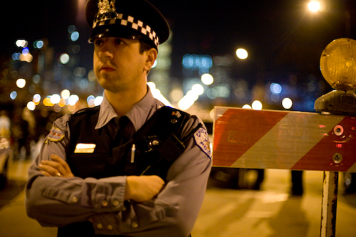 Police on foot and horseback create barriers for the thousands of people coming into the park.