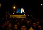 Obama looks down on the crowd from a Jumbotron screen as they leave Grant Park.
