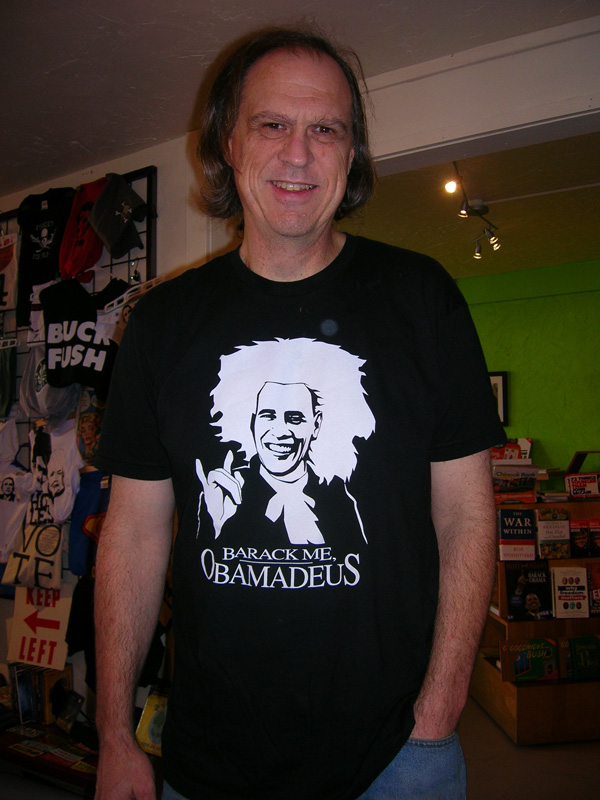 Jon deLeeuw owns the store with wife, Kara Ciello. He is wearing one of CielloaE™s top picks of favorite merchandise. The storeaE™s political T-shirts range from about $18-24.