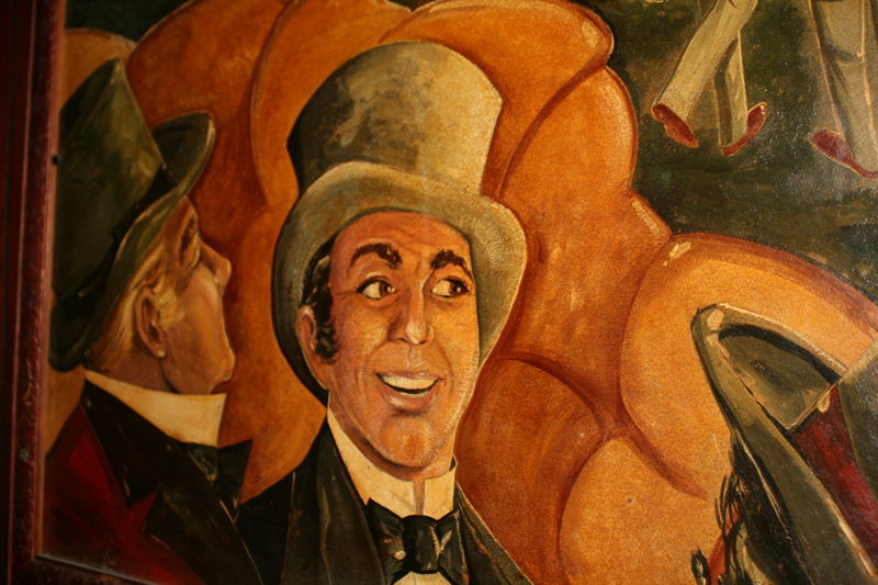 About ten years ago we were offered $50,000 for the big one and $40,000 for the little one Tislow tells me. Who wanted to buy them and why they weren't sold is unknown, I can't disclose that because in the first place, that was ten years ago, and now I'm going to be 81 so think about my brain says the spunky Tislow. All we could find out about the artist was a name painted in the corner, McDaniel. Who McDaniel was, we may never know. I'm guessing that's the case for a lot of murals and other art around town. If you see a mural out there that sparks your interest, I suggest you ask lots of questions now because you never know how long it will be there, or if one day, you'll be the only one alive to tell its story.