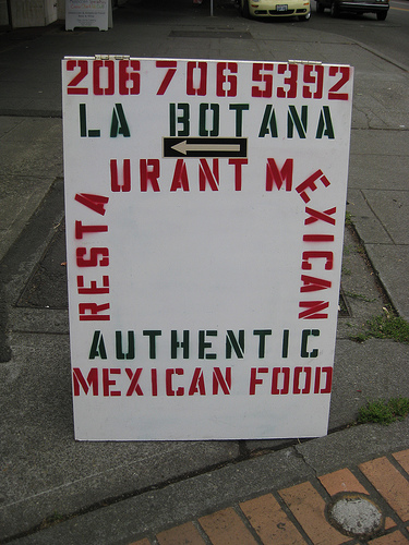 Phinney Ridge vs. Greenwood (A Tale of Two Sandwich Boards): The sandwich board comparison sums it up well. On the bright side we have a homey Greenwood market, a vacated McDonalds, a vacated tullys, a throwbacks for a freddys, a future brewery pub, a core street intersection, all giving GW dinstinction and funky uniqueness. In deference to the oddest of odd street platting, the southbound GW Ave approach to 85th swerves you around making a perfect Chamber slogan: Greenwood - A little bent but not out of shape. - Submitted by peter