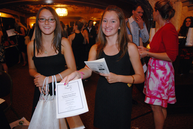 Welcome! Would you like a program and a schwag bag?