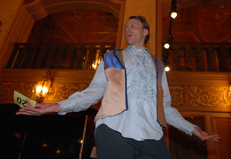 The only male model of the night hams it up.