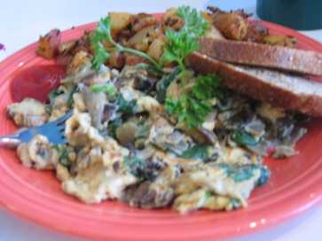 Neat Loaf, Healthy Bread, and the Ookies at Silence-Heart-Nest: SHN's Mediterranean Omlette is the best in the city. I ate it every Sunday for two years when they were at their old location in the U-District. I still go back when I need to be comforted with a good wholesome and delicious meal. - Submitted by I love to eat