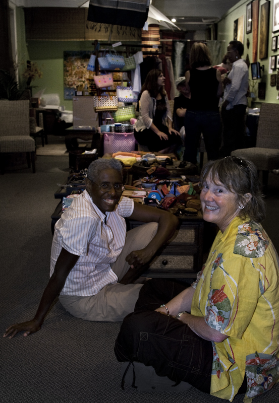 Theresa and Caroline sit in Lanna Trading Company enjoying music and homemade pad thai.