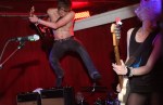 Lunn jumps off the drum set as The Subways play Chop Suey on Monday night.