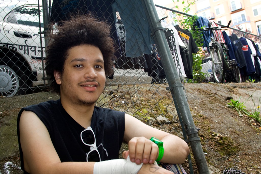 This young man takes a break from the hustle and bustle of the market.