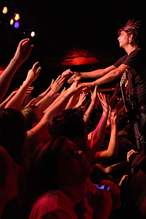 Robbie shows the fans some love.