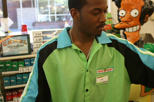 Apu works the counter.