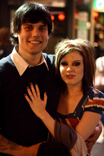 These two got engaged at the show, onstage, during the band's encore.