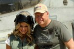 International superstar Jessica Simpson and her father, Joe, pose for a snapshot on the flight line at Camp Buehring, Kuwait on March 10, 2008.  Ms. Simpson toured the camp and visited with troops during the day beforel performing at the Operation:Myspace concert in the evening.  (U.S. Army photo by Pfc. David J. Marshall) (Released by Maj. Elton Roberts, USAR CENT PAO)