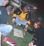 Artist Amanda Mae unrolls a square of Astroturf in a parking spot, pays for her time there, and begins a game of Scrabble with some friends. She said: I don't have a car, and this is public space, so why I can't I use it for good instead of evil?