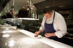 Copperleaf resides in the lobby of Cedarbrook where executive chef Mark Bodinet, bottom left, prepares technically accomplished dishes like this lamb saddle, bottom-right.