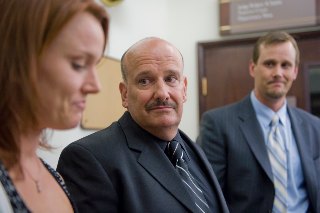 Spencer, center, and his children, Kathryn Tetz and Matthew Spencer, talk to the media outside the Clark County Courthouse in 2009. (The Columbian/Zachary Kaufman)
