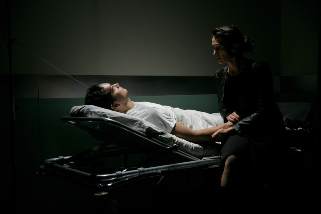 Kayleen (Zarr) tends to Doug (Sloniker).