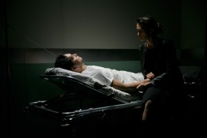 Kayleen (Zarr) tends to Doug (Sloniker).