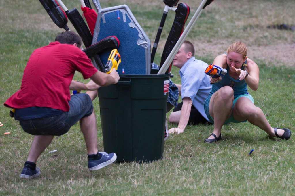 A one on one showdown develops mid field between two opposing players.