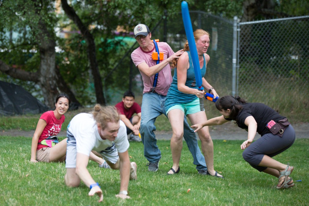 The last of her team, a loyal blue team member swats a zombie player with the flag. The zombies won.